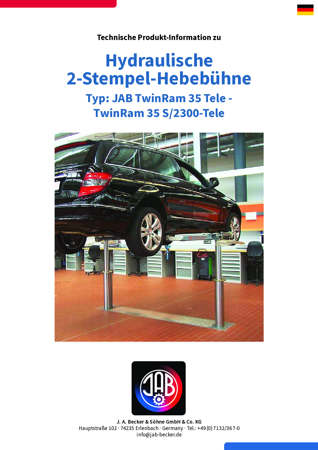 Ein schwarzer Wagen wird von einer hydraulischen Hebebühne angehoben