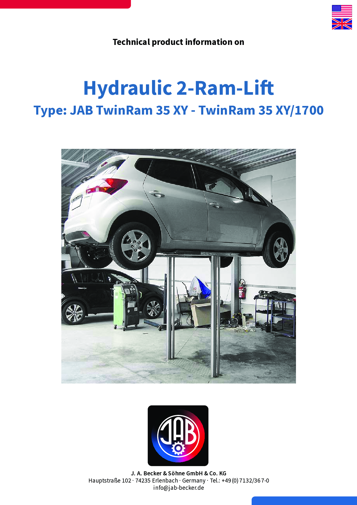 Ein Fahrzeug, das auf einem hydraulischen 2-Ram-Hubtisch in einer Werkstatt angehoben wird.